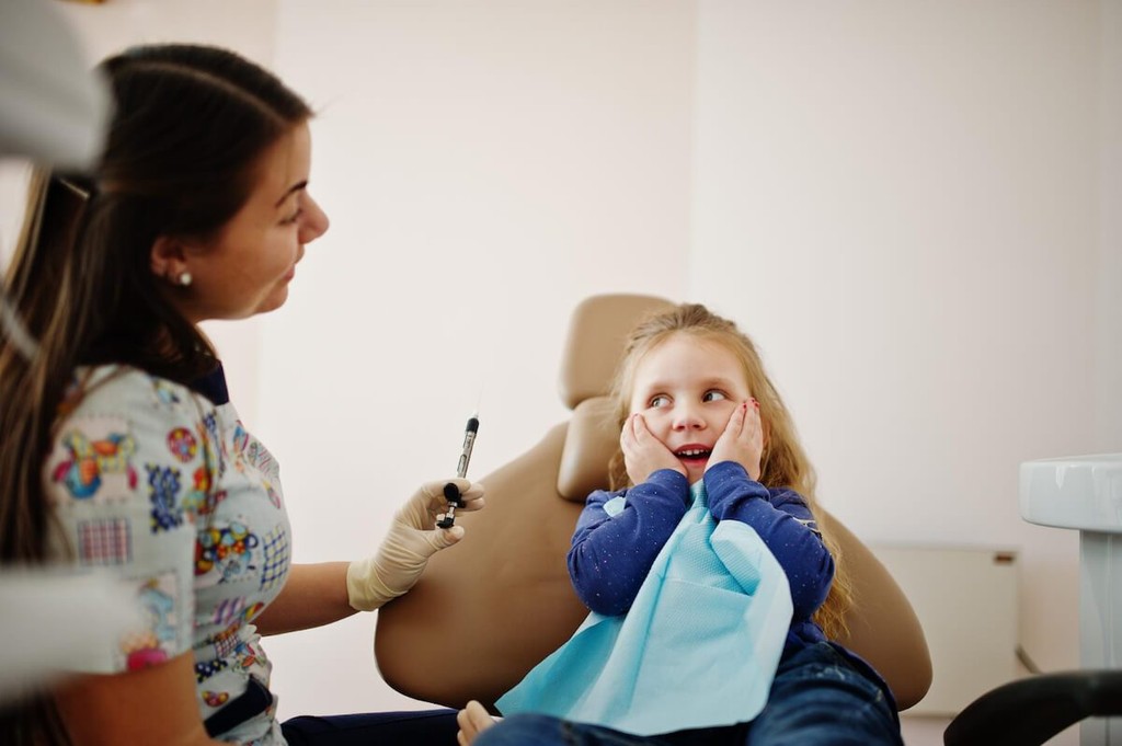 everything you need to know about your childs first teeth